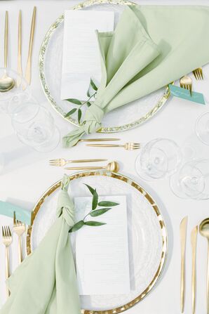 Gold-and-Green Place Setting for Wedding at Savoia Castle in Prague, Czech Republic