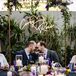Grooms and Neon Signage at Wedding Reception