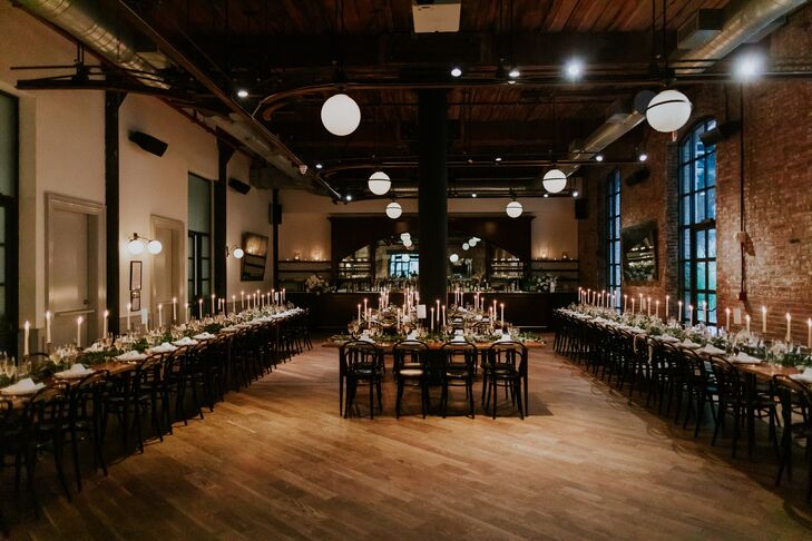 Dimly Lit, Industrial Reception Space in NYC With Candles and Exposed Brick