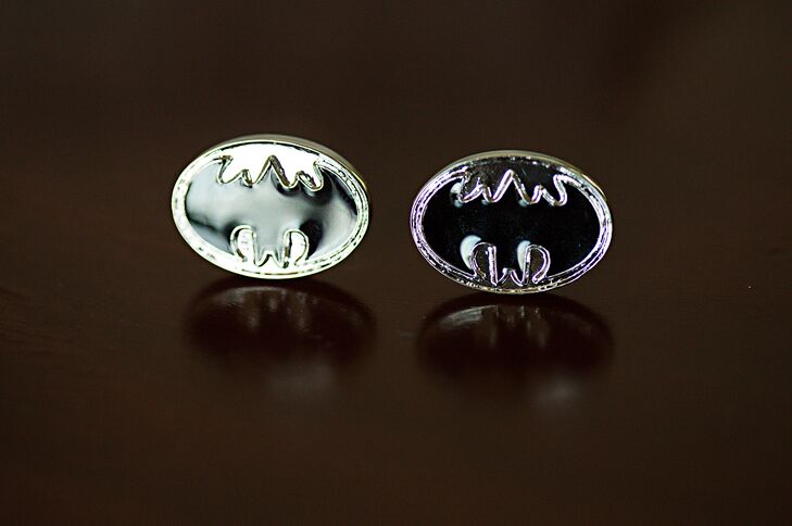 The groom wore Batman cufflinks for a little superhero flair at the wedding.