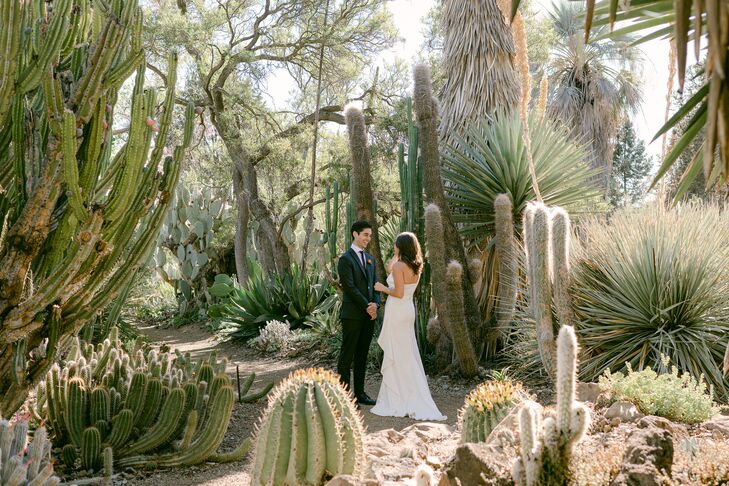 Bride and Groom Having a First Look in a Garden Amongst Cacti and Desert Plants