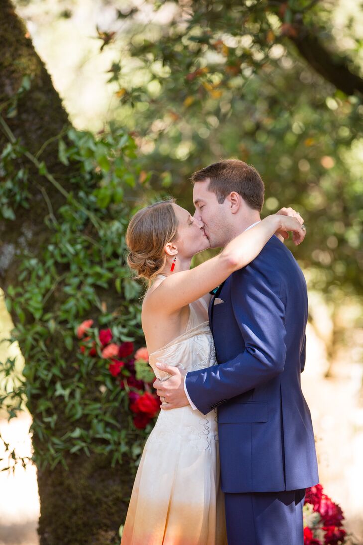 Karin's stunning red ombre dress was complemented by Ben's cool navy suit.