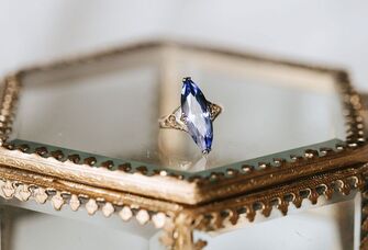 vintage-style purple engagement ring