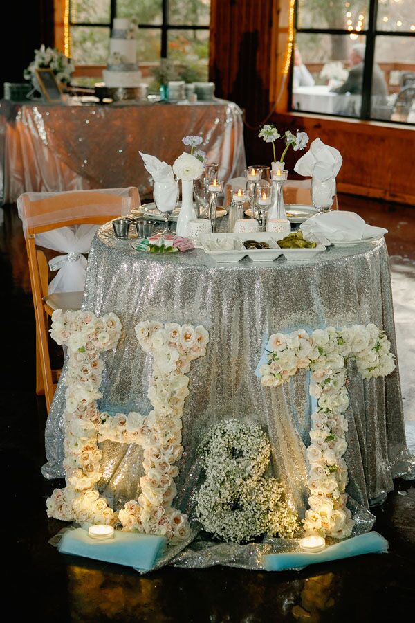 Flower-Covered Initials at Silver Sweetheart Table