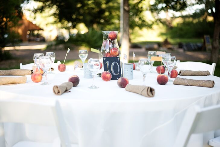 Matching the place cards, peaches were scattered on the dining tables for simple decor and a pop of color.