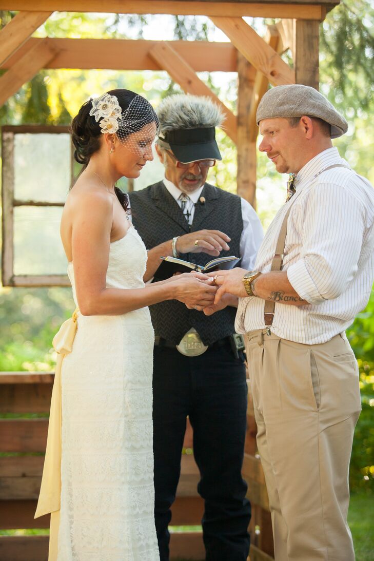 Couple Holding Hands at Ceremony