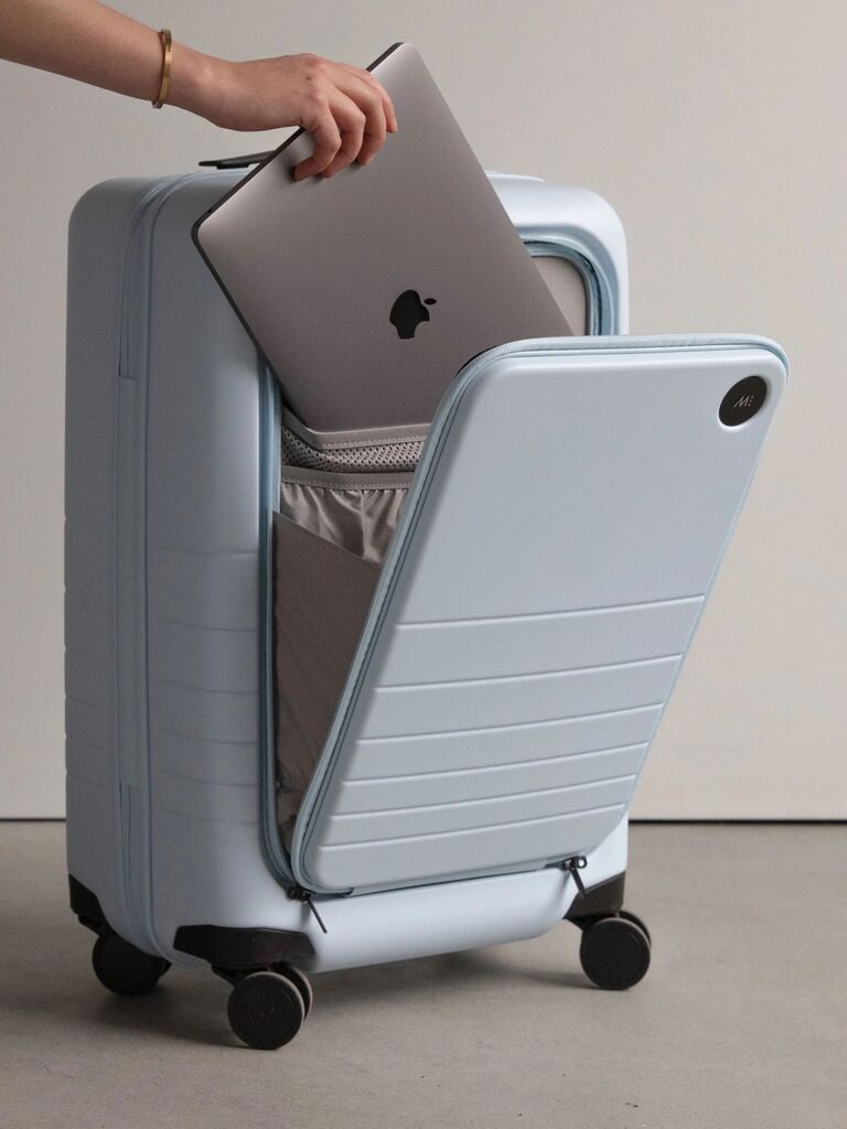 Monos light blue carry-on luggage with front pocket for wedding registry