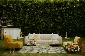 Cocktail Hour Lounge Vignette, Sofa and Plush Chairs, Rug, Coffee Tables and Gold Details in Garden