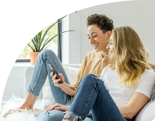a couple using TheKnot Wedding App together