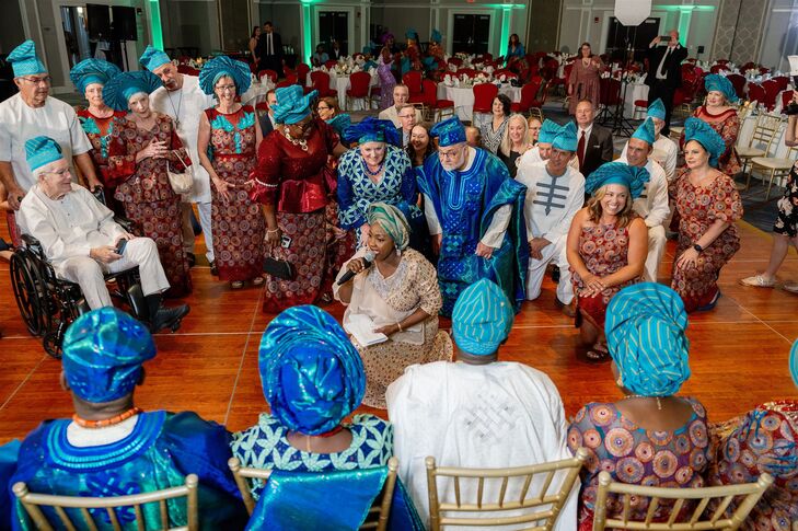 Groom's Family and Leader Kneeling Before Bride's Family at Traditional Yoruba Engagement Ceremony