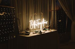 Custom Neon Sign on Photo Props and Suspended String Lights