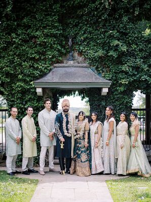 Wedding Party Dressed in Traditional Indian Lehenga and Sherwani Outfits