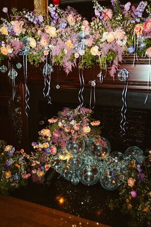 Fireplace Reception Installation, Disco Balls, Pastel Flowers and Ribbons