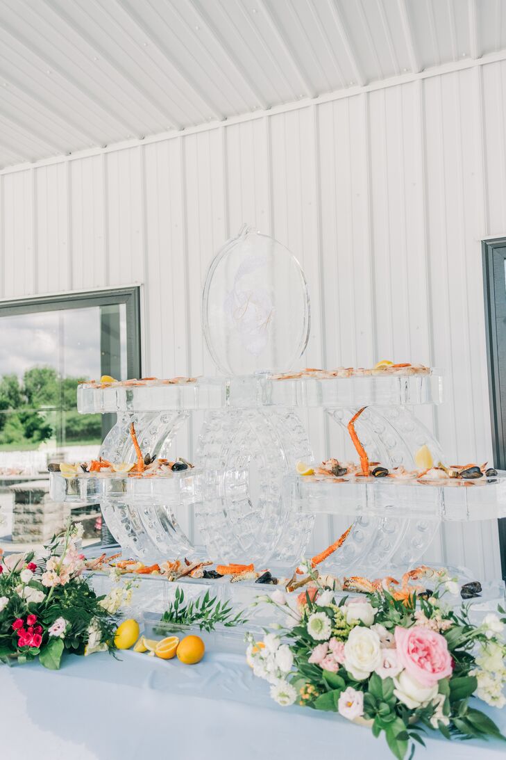 Ice Display of Fresh Seafood Appetizers With Couple's Custom Logo