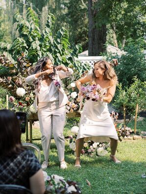 Brides Dancing at End of Backyard Wedding Ceremony