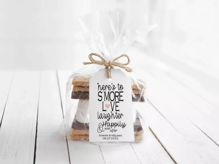Take-home s'mores kits featuring graham crackers, marshmallows, and chocolate. 