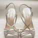 Heidi wore glitter silver strappy heels, adding a touch of glam to her bridal style.