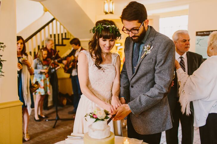 Bride and Groom Cutting the Cake