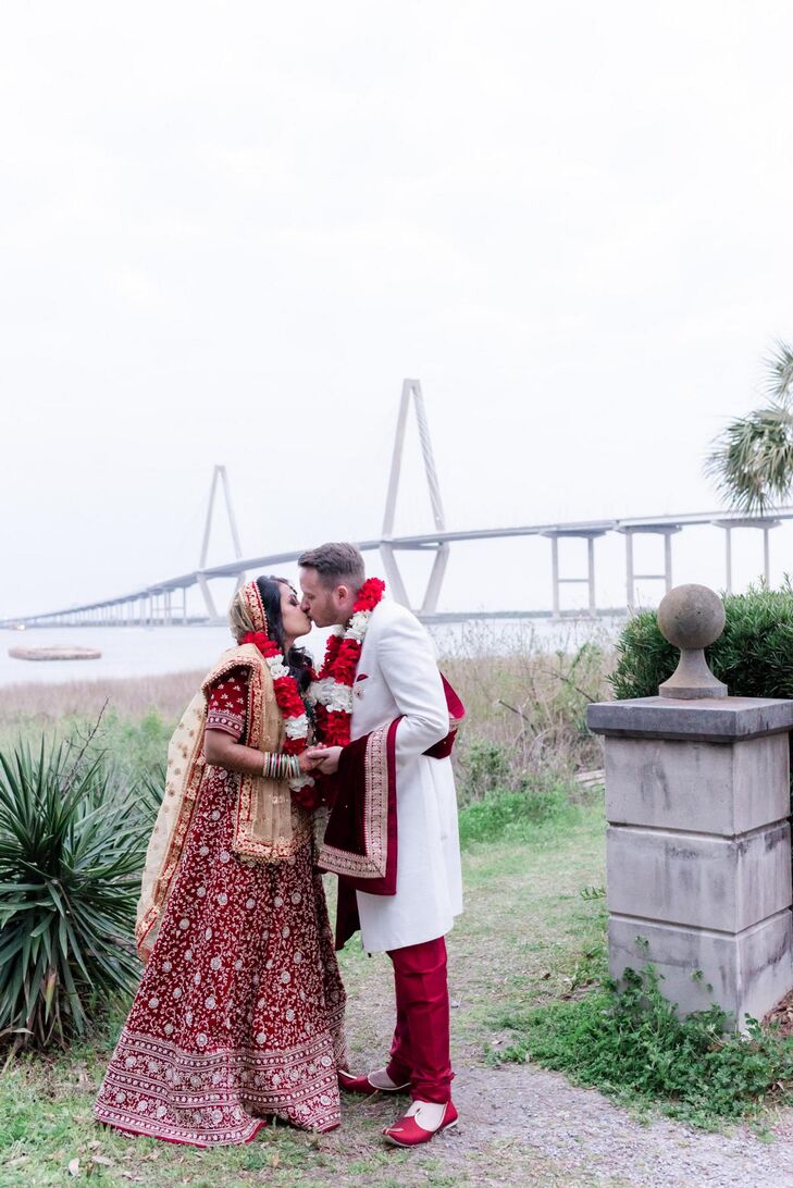Couple Sharing Kiss in Front of Ravenel Bridge in Charleston, South Carolina