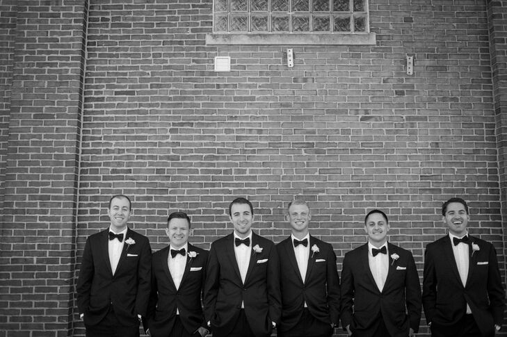 Each of the groomsmen wore classic black tuxedos and bow ties by Vera Wang.