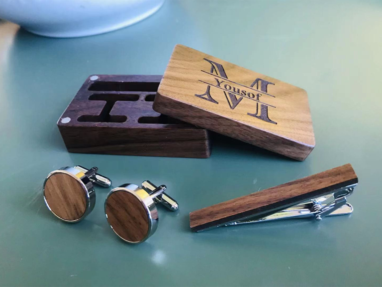 Round stainless steel cuff links with wooden center and matching tie bar