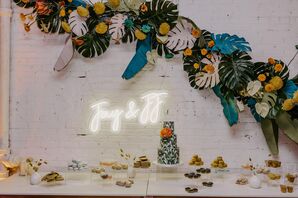 Colorful Cake Table with Neon Sign