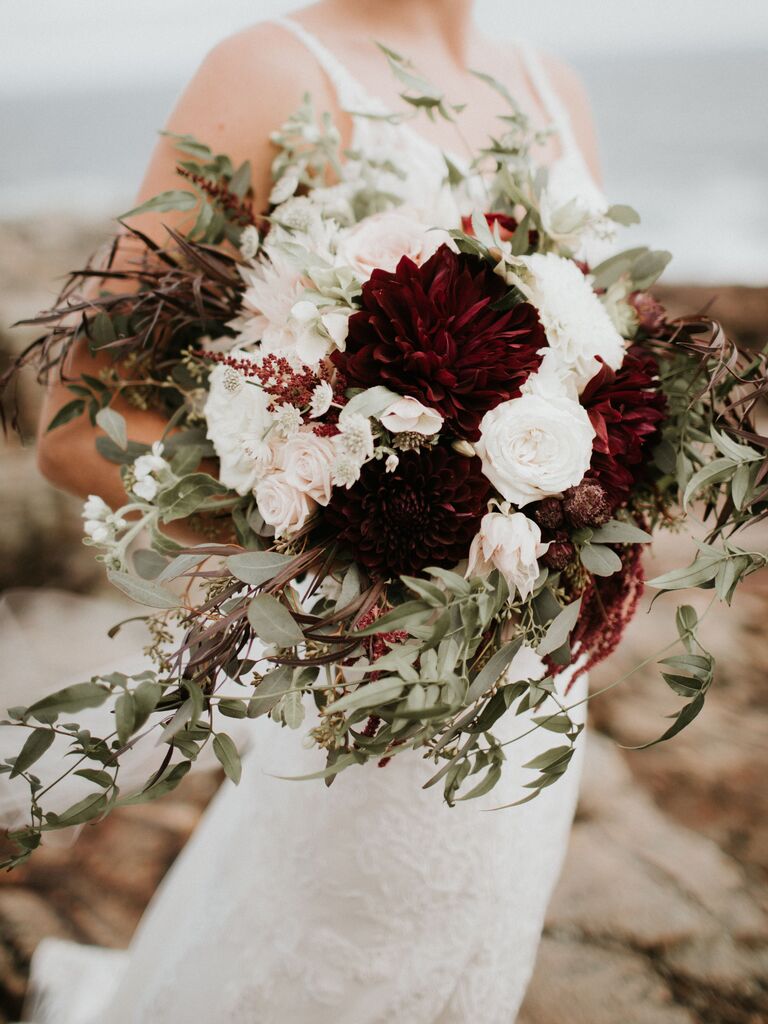 elegant fall wedding bouquet with dark red dahlias and white roses