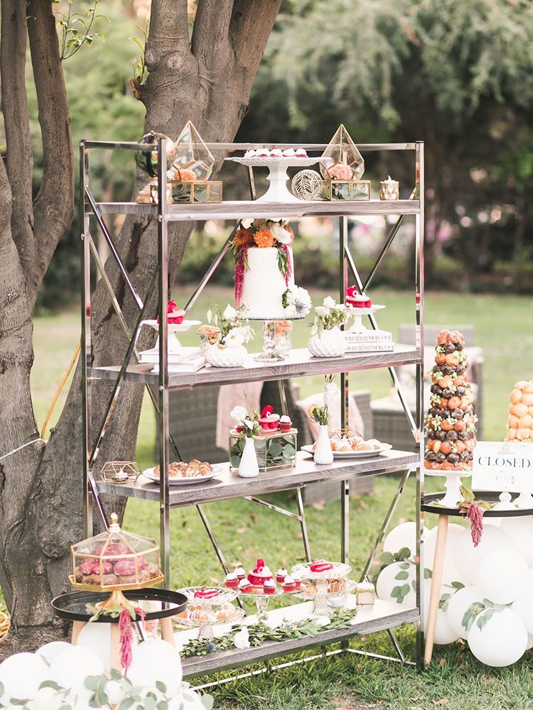 dessert buffet with metallic silver shelf