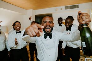 Groomsmen Getting Ready Around Groom With Champagne, Tuxedo Suits