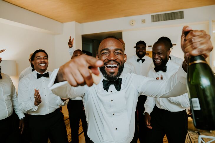 Groomsmen Getting Ready Around Groom With Champagne, Tuxedo Suits
