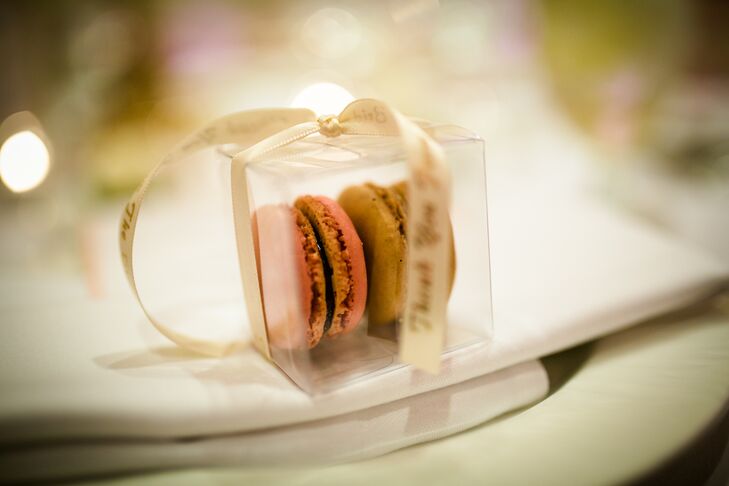 Wanting to play up their love of travel and appreciation for French culture, Rebecca and Jonathan gave each guest a small box of French macarons, which they displayed at each place setting. The macarons were made at Patisserie on Newbury and came in pistachio, coffee and raspberry flavors. “The patisserie was also able to make gluten-free options for a couple of our guests with dietary restrictions,” Rebecca says.
