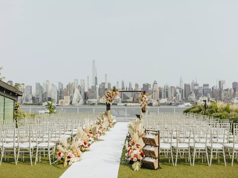 This modern wedding arch embraces both boho and urban aesthetics.