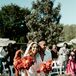 “The theme of our wedding was a garden oasis,” says Dom (right), a firefighter/EMT. “Flowers have been our love language from the beginning of our relationship.”