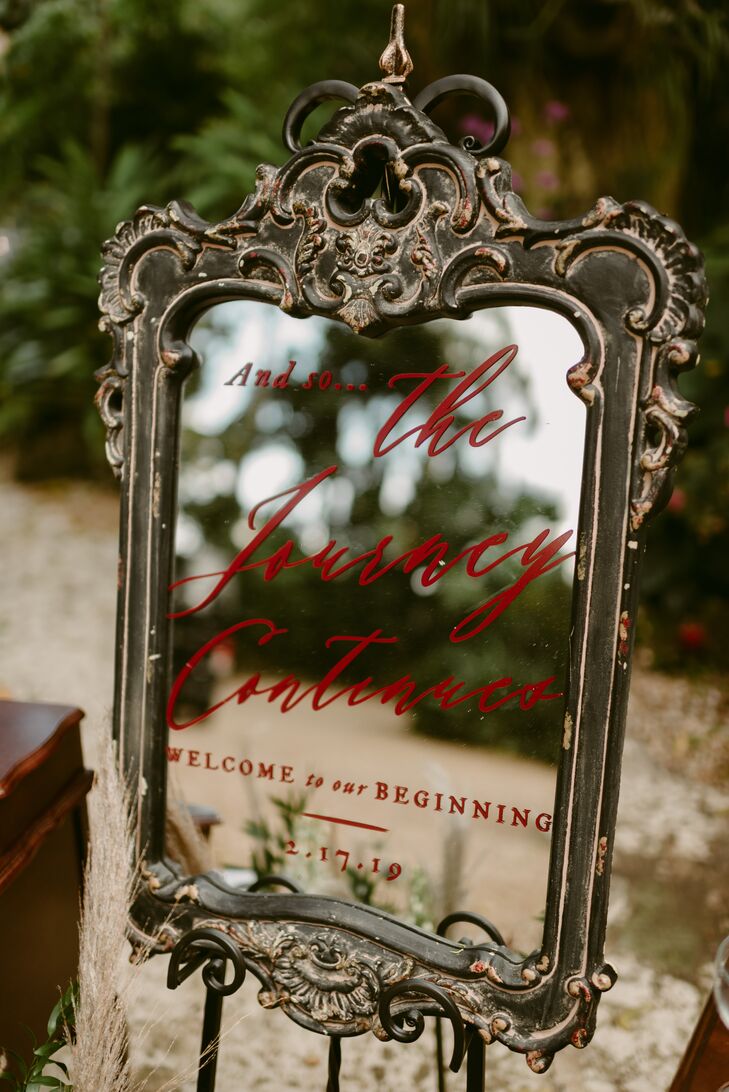 Vintage Mirror Sign with Red Calligraphy