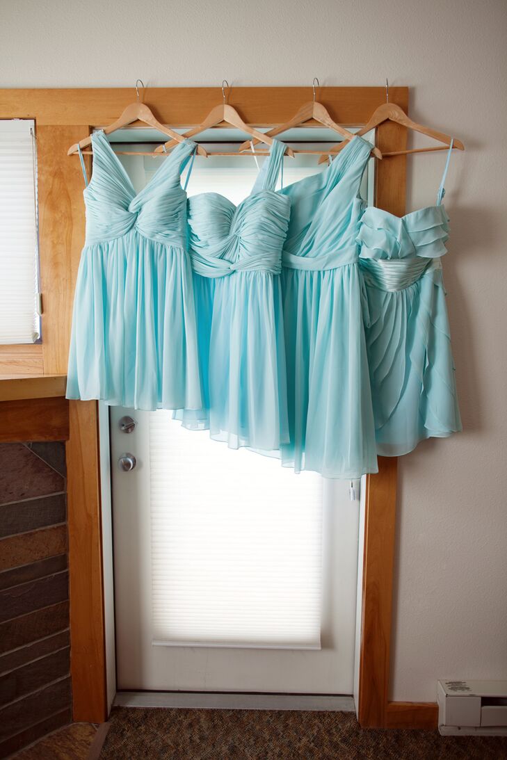 Each bridesmaid picked a different light blue dress for Brynn's special day.