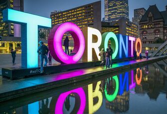 The neon Toronto Sign in Nathan Phillips Square in Canada.