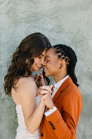 Brides Hugging During Wedding Portraits