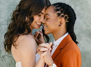 Asia Sullivan, PA-C, MPH (a physician's assistant and social media influencer) and Tierra Andrews (a product designer) tied the knot with a beautiful 
