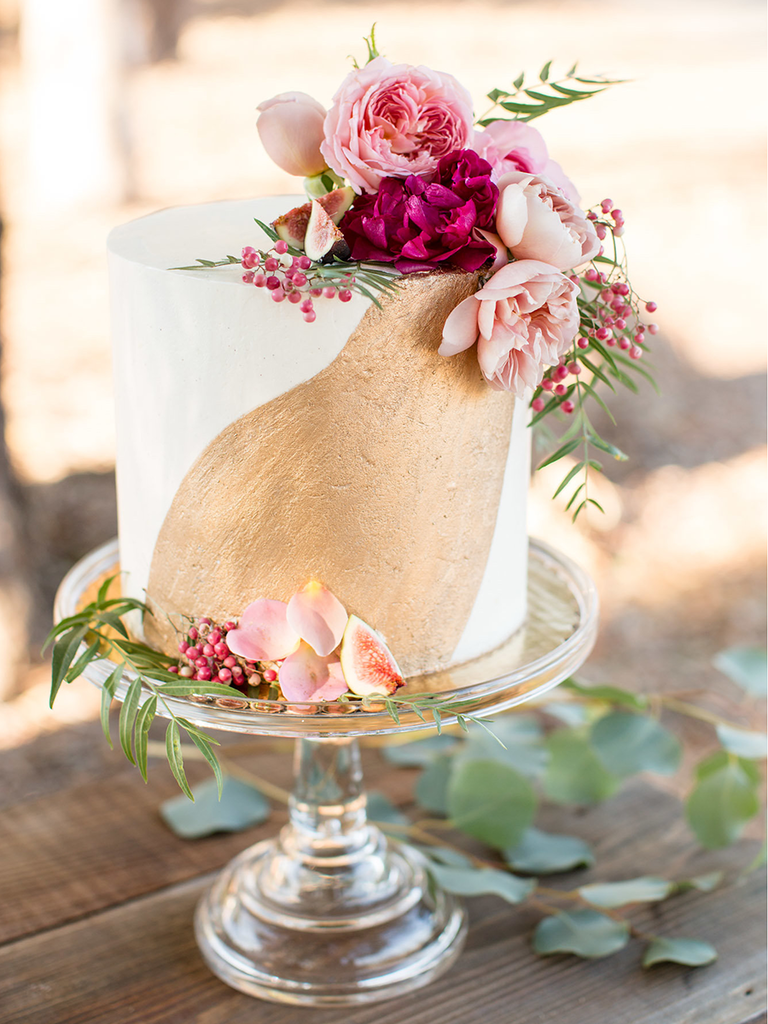 simple wedding cake with gold paint