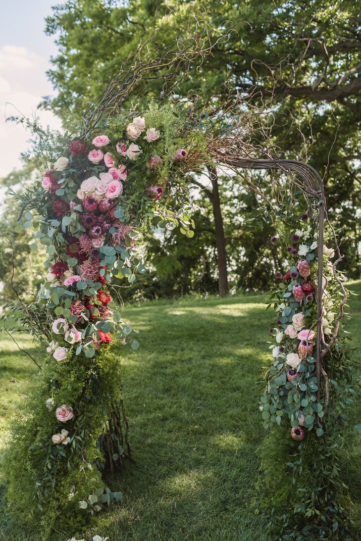 Outdoor Ceremony Arch with Flowers and Greenery