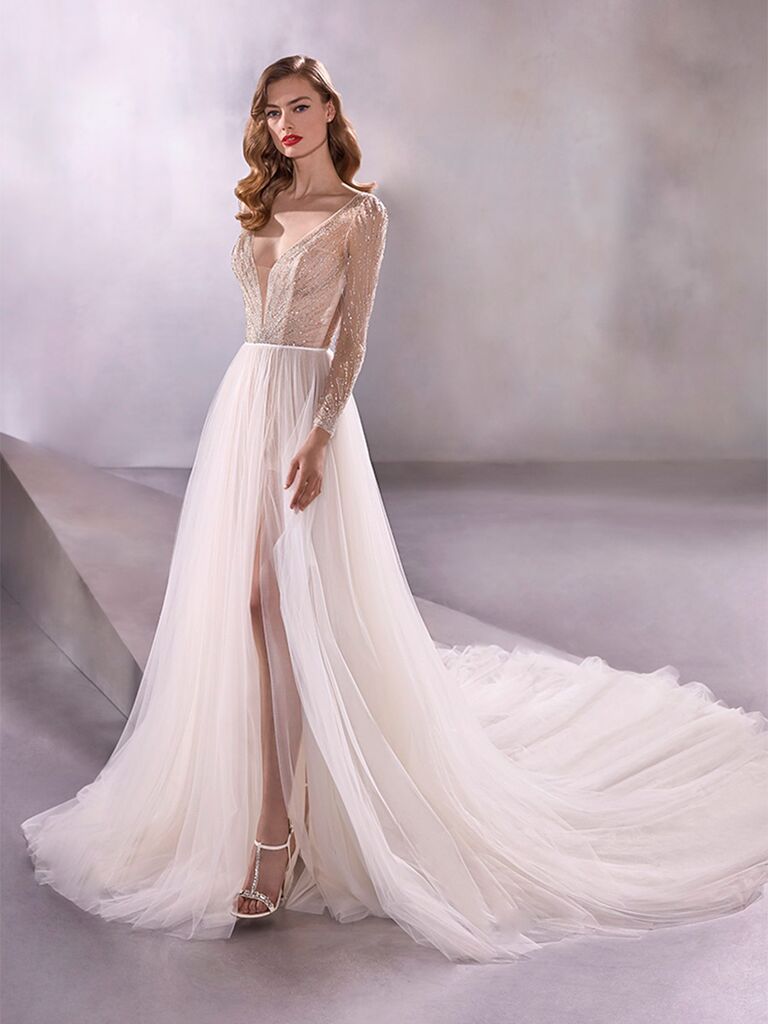 Atelier Provonias wedding dress long-sleeve dress with beaded bodice and tulle skirt