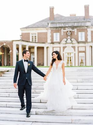 The Bride and Groom Posing for Wedding Photos in Front of the Seversky Mansion