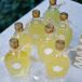 The grooms aunts helped to create these tasty Italian weddings favors. Guests were each sent home with a small bottle of homemade Lemoncello and a wrapped Biscotti. For Julia and Gian, it was a more personal way to thank their guests.