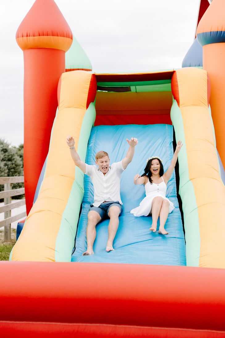 Bride and Groom on Inflatable Slide