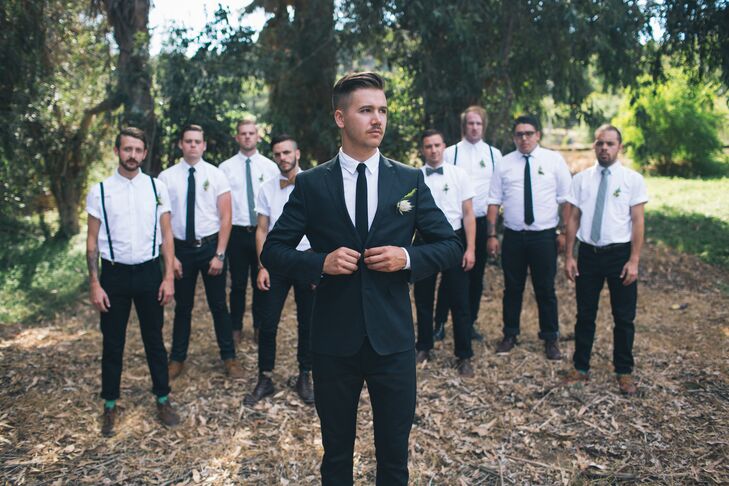 It was important to me the guys looked like themselves, explained TJ. I've been in a lot of weddings and have worn some pretty funny outfits. Slacks that swallowed my legs, shirts that might as well be used as tarps. I didn't want any of that. All I told them was white shirts (long or short sleeved), black pants, brown or black shoes, and an accessory of their choice (suspenders, bow tie, skinny tie). For his own look, TJ chose a pair of black jeans, a white button-down shirt and black blazer.