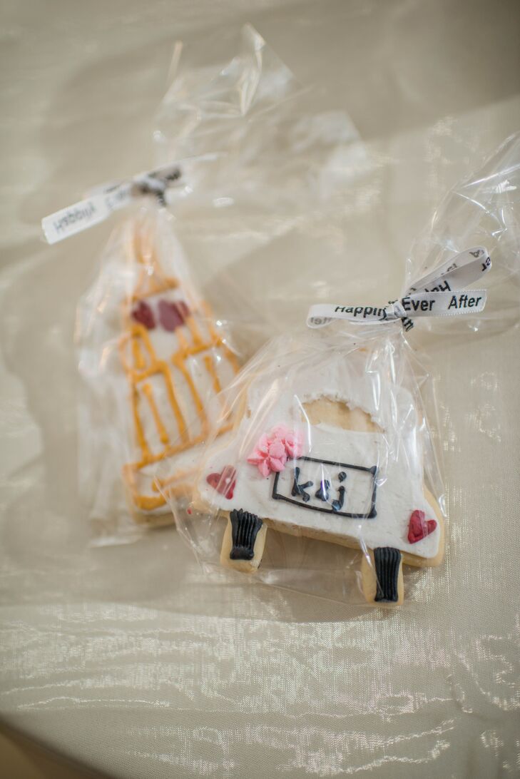 Cute frosted cookies were given to guests as sweet treat favors.