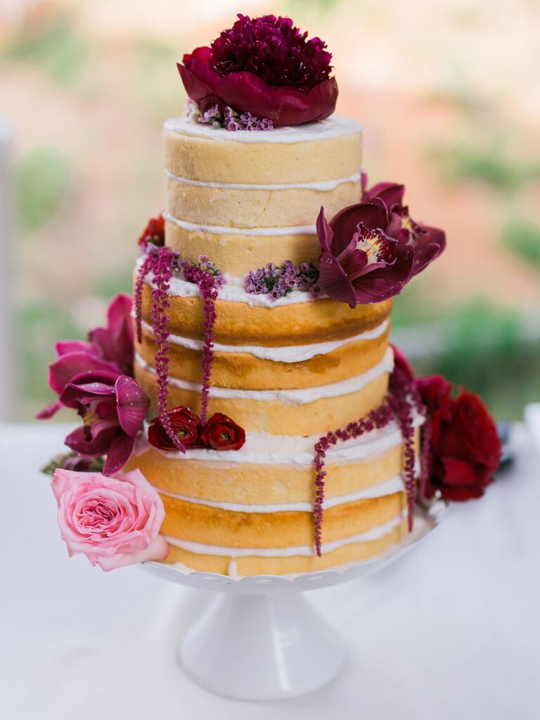 three tier naked wedding cake with vanilla sponge, burgundy amaranthus, orchids and pink rose