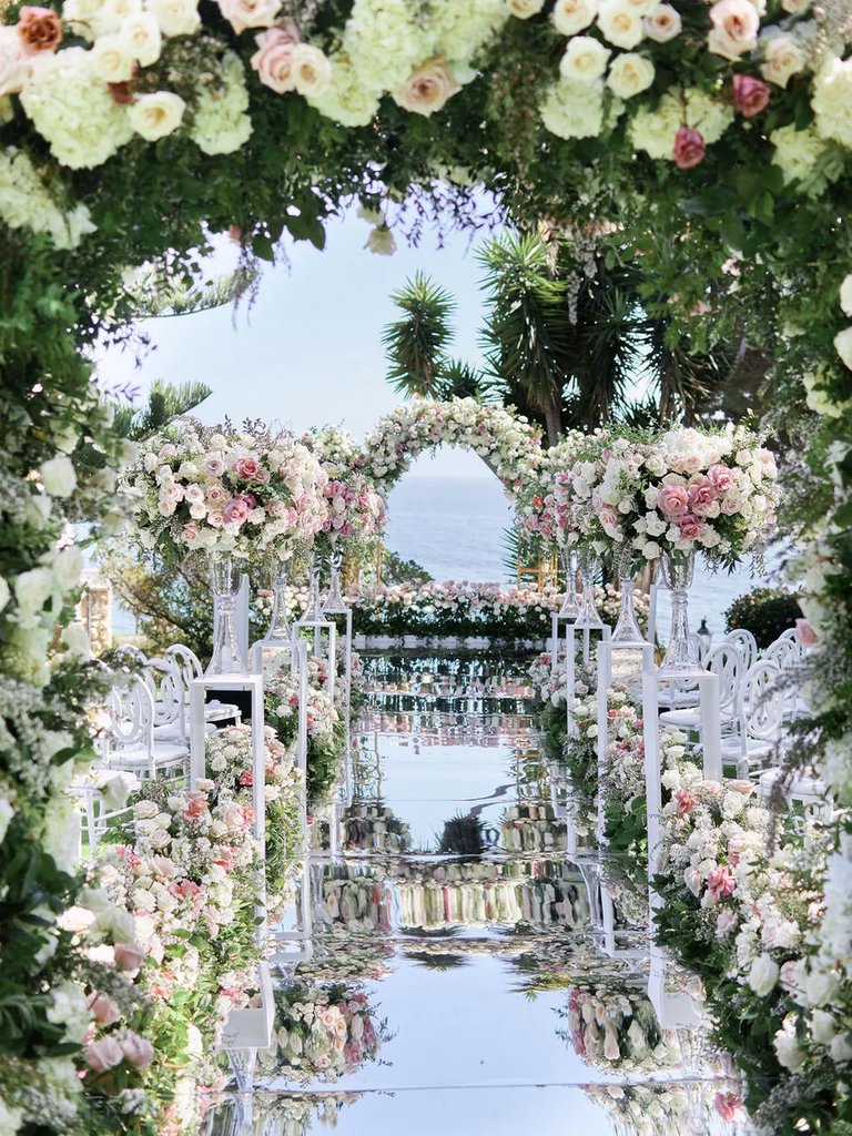 This reflective wedding aisle is sure to stun a crowd.