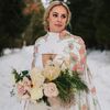 Poinsettias Filled This Snowy Winter Wedding at Castle Farms in Charlevoix, Michigan