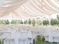 Wedding reception decor with tent draping